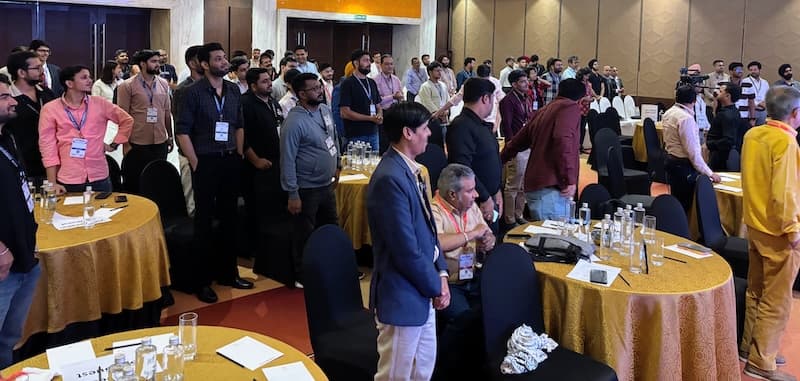 Attendees standing in the hall at Web Impact Summit 2026